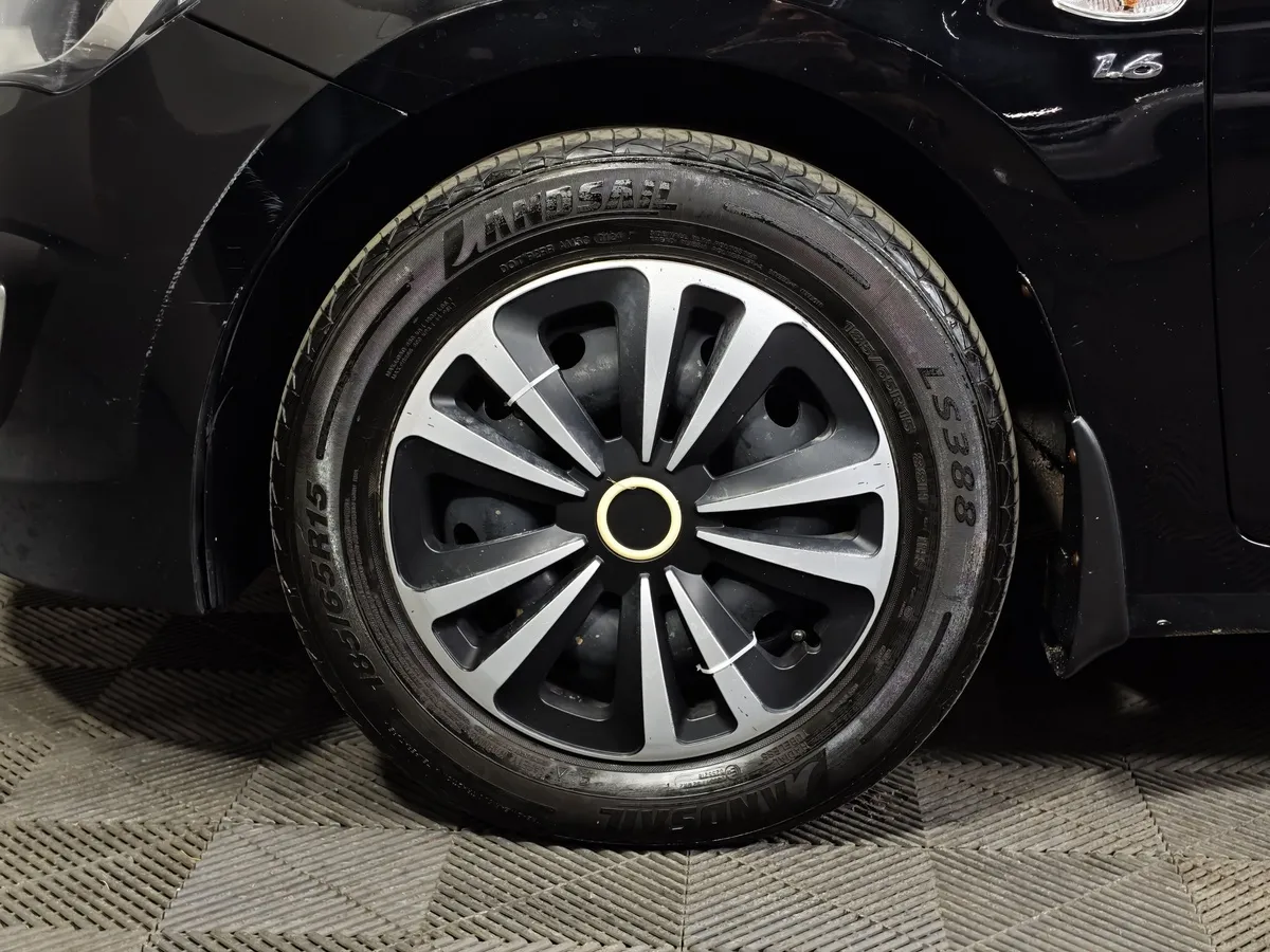 Hyundai Solaris 1.6 MT (123 л.с.) Comfort Черный в АВИЛОН. Слайд №9