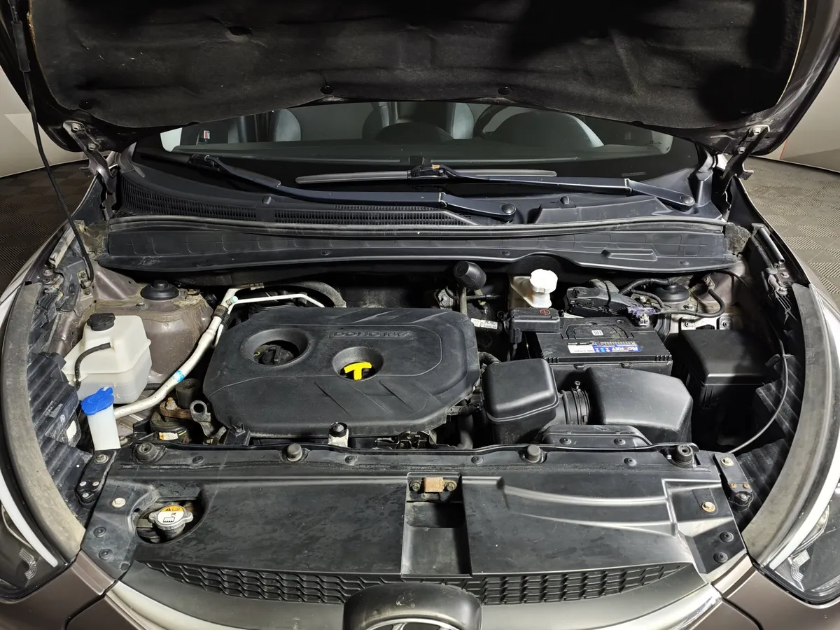 Hyundai ix35 2.0 AT 4WD (150 л.с.) Travel Коричневый в АВИЛОН. Слайд №11