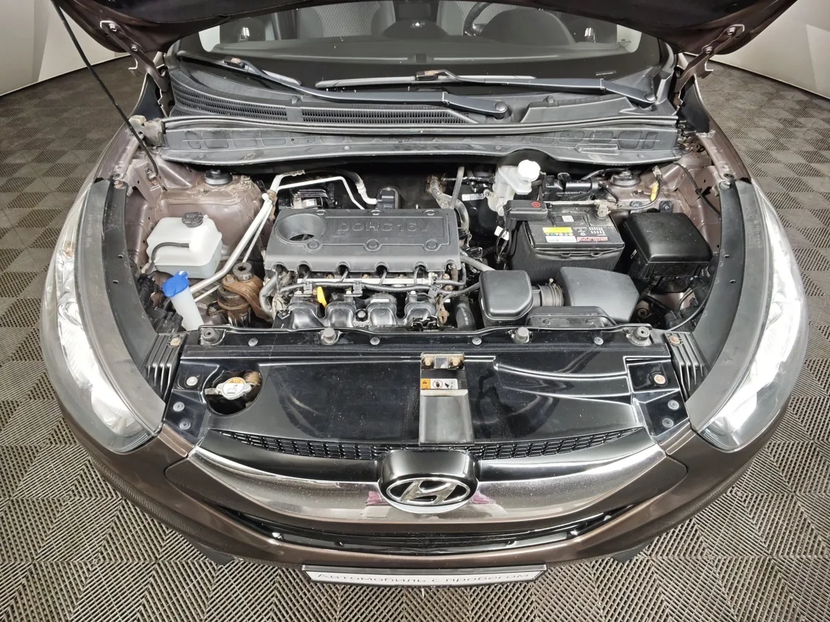 Hyundai ix35 2.0 MT 2WD (150 л.с.) Classic Коричневый в АВИЛОН. Слайд №11