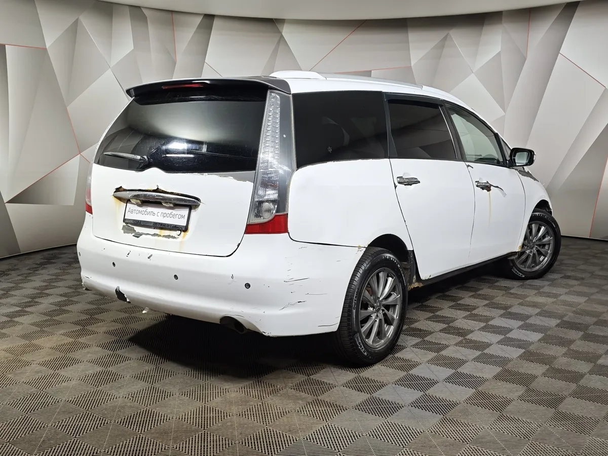 Mitsubishi Grandis 2.4 AT 4WD (165 л.с.) Белый в АВИЛОН. Слайд №9