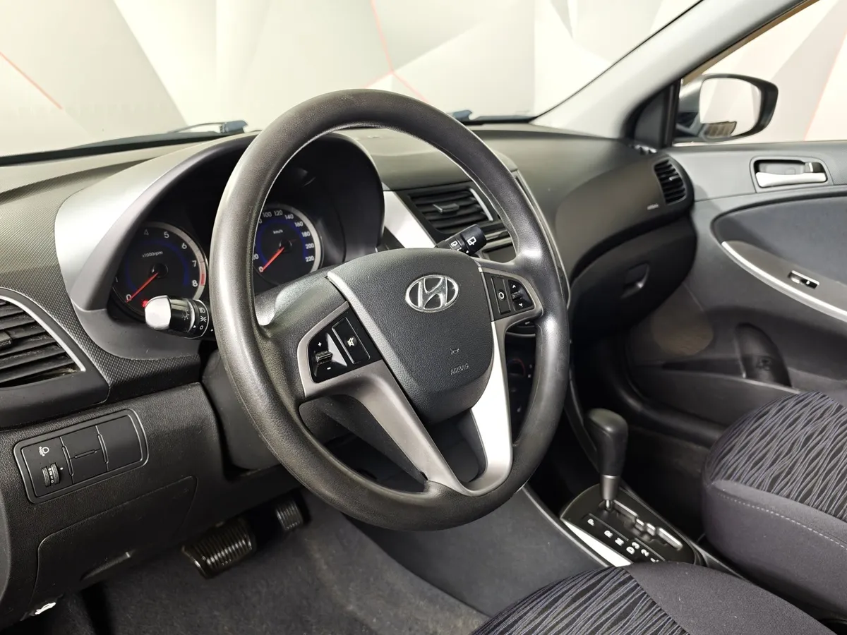Hyundai Solaris 1.4 AT (107 л.с.) Classic Коричневый в АВИЛОН. Слайд №19