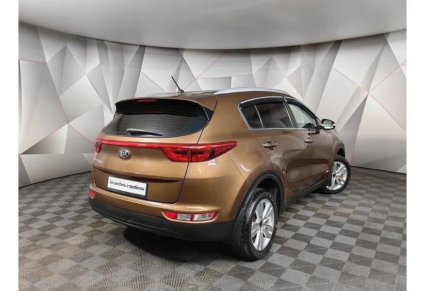 Kia Sportage 2.0 AT 4WD (150 л.с.) Comfort Коричневый в АВИЛОН. Слайд №2