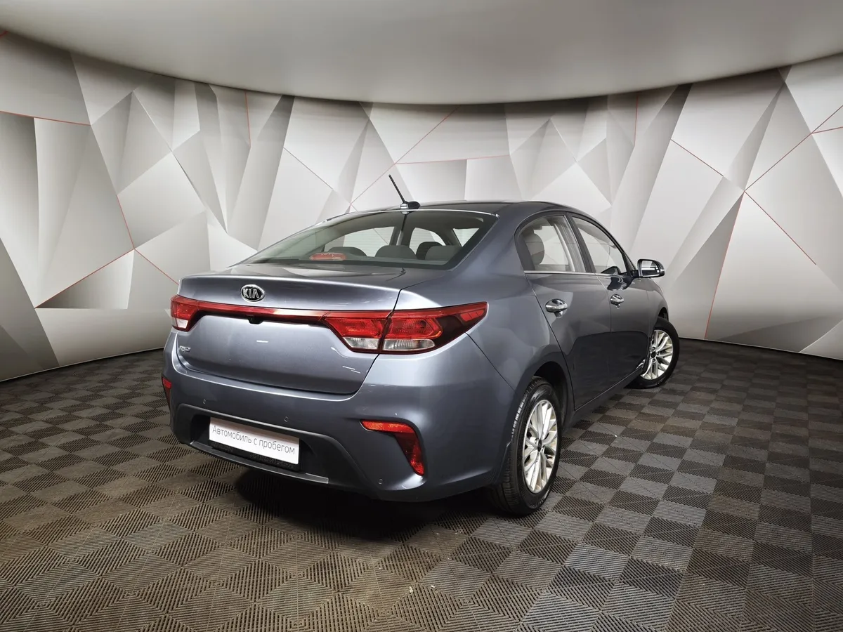 Kia Rio 1.6 AT (123 л.с.) Серый в АВИЛОН. Слайд №2
