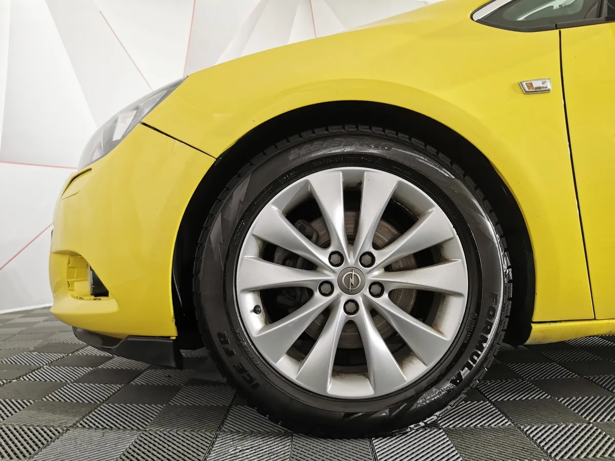 Opel Astra 1.4 Turbo AT (140 л.с.) Enjoy Желтый в АВИЛОН. Слайд №9