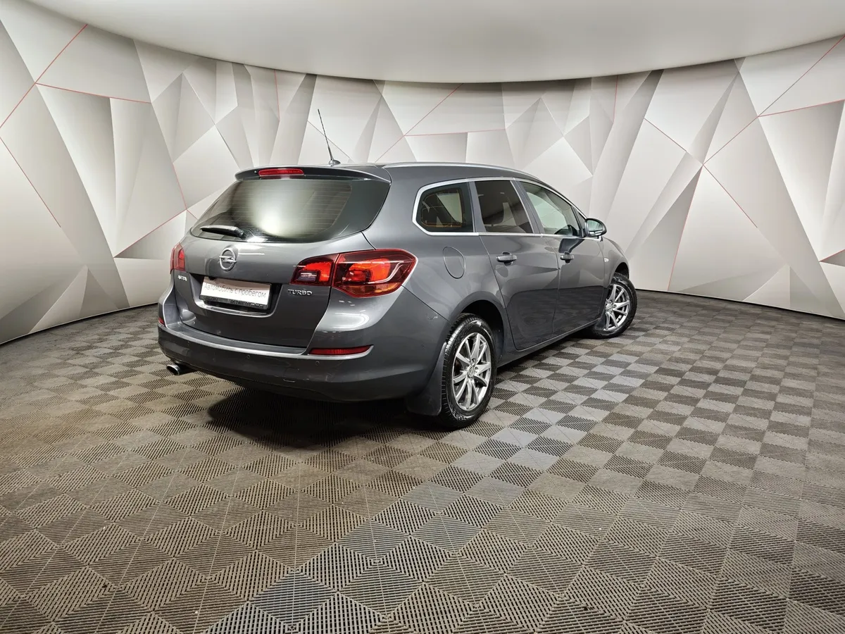 Opel Astra 1.4 Turbo AT (140 л.с.) Серый в АВИЛОН. Слайд №2