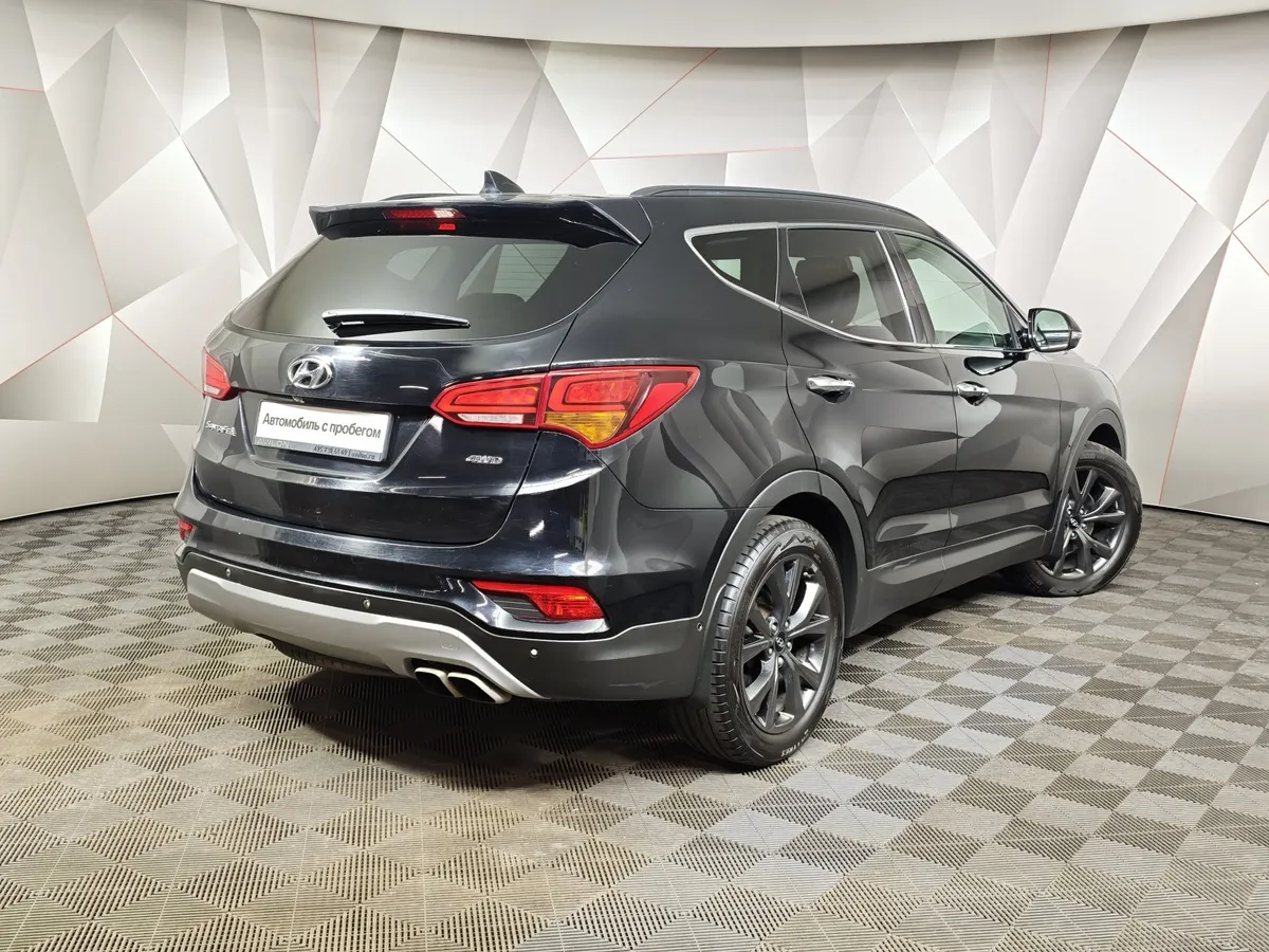 Hyundai Santa Fe 2.4 AT 4WD (175 л.с.) High-tech Черный в АВИЛОН. Слайд №2