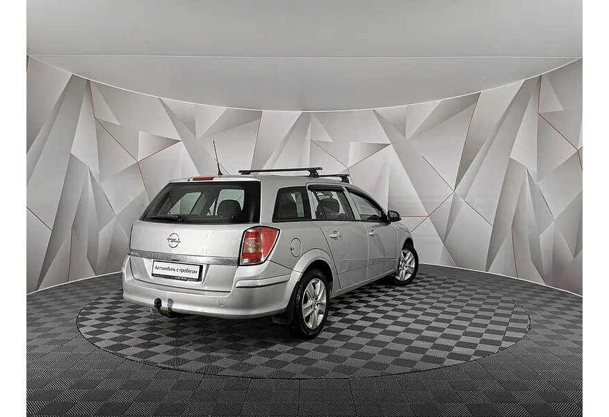 Opel Astra 1.6 MT (115 л.с.) Серебристый в АВИЛОН. Слайд №2