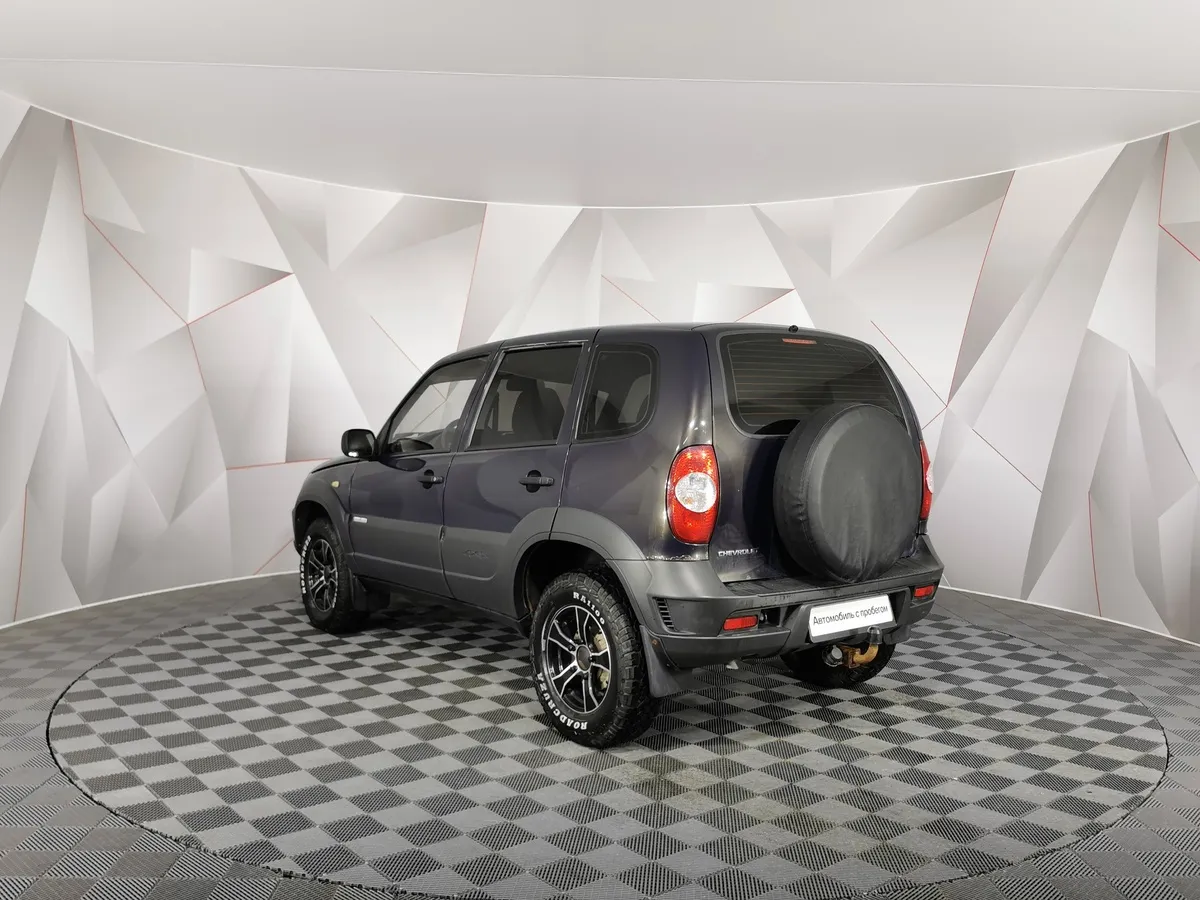 Chevrolet Niva 1.7 MT (80 л.с.) Зеленый в АВИЛОН. Слайд №4