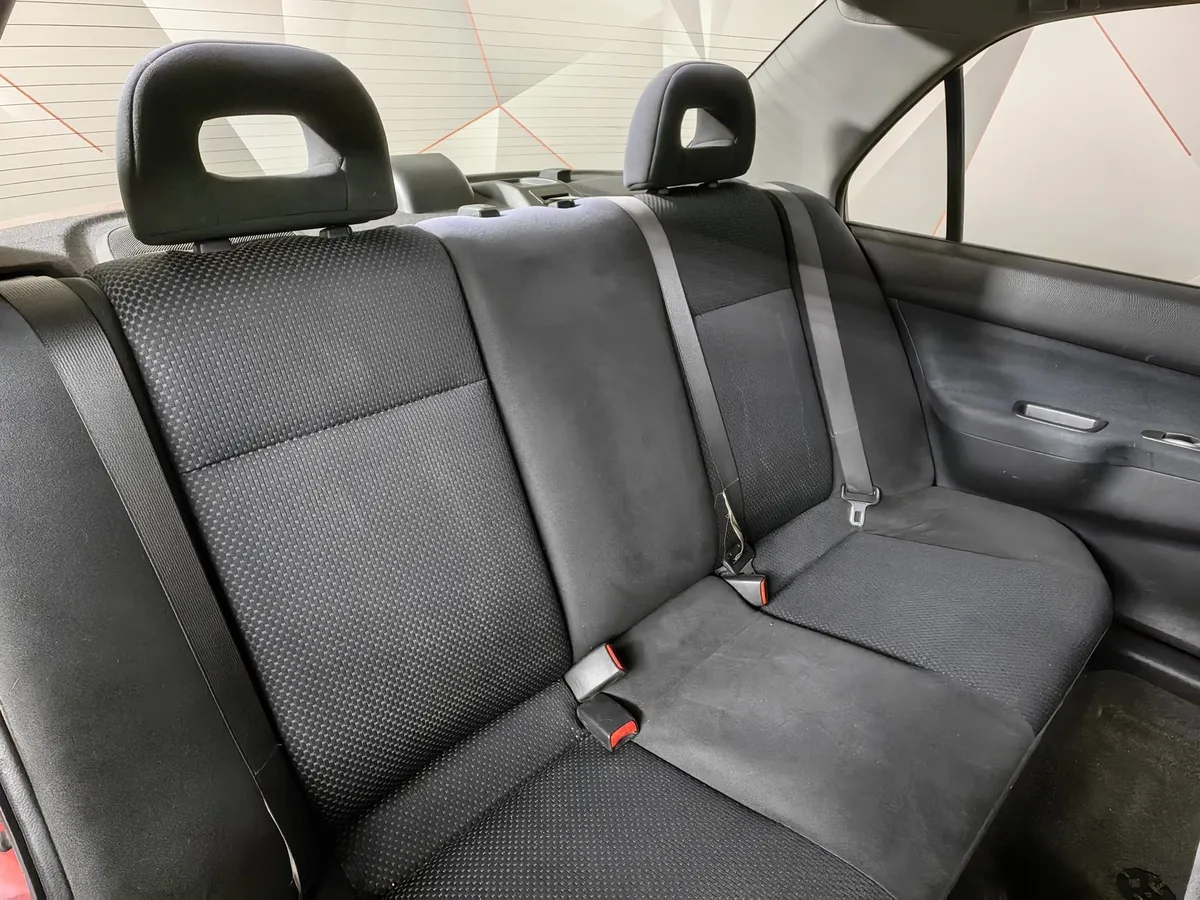 Mitsubishi Lancer 1.6 AT (98 л.с.) Красный в АВИЛОН. Слайд №12