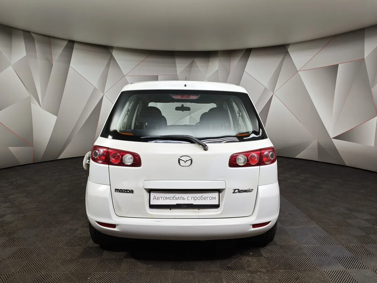 Mazda Demio 1.5 AT (100 л.с.) Белый в АВИЛОН. Слайд №8