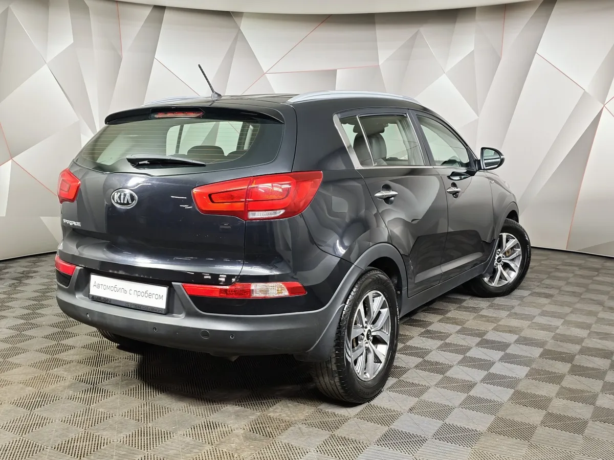 Kia Sportage 2.0 AT AWD (150 л.с.) Черный в АВИЛОН. Слайд №2