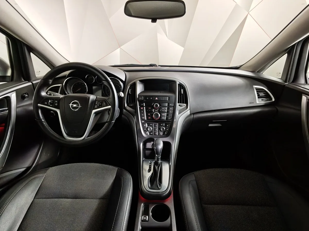 Opel Astra 1.4 Turbo AT (140 л.с.) Серебристый в АВИЛОН. Слайд №12