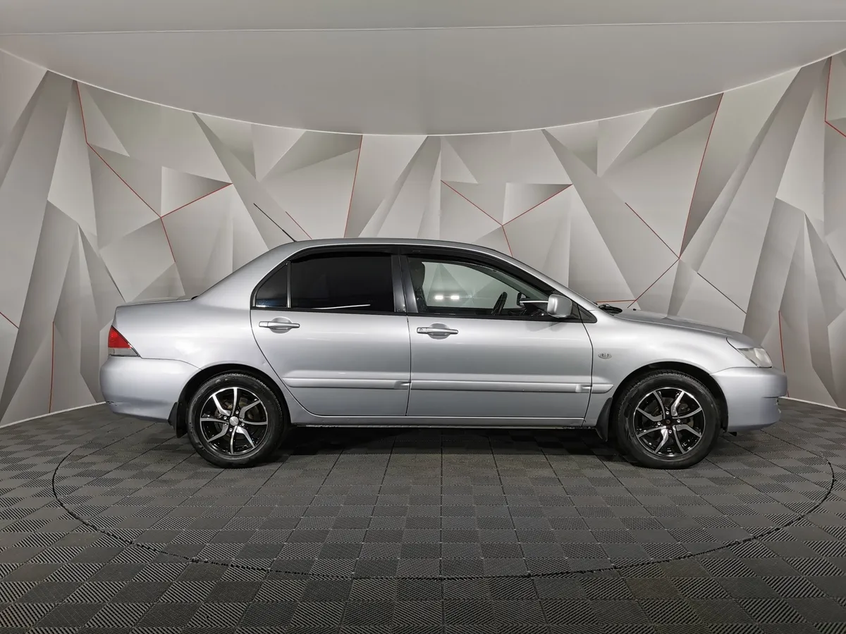 Mitsubishi Lancer 1.6 MT (98 л.с.) Серый в АВИЛОН. Слайд №6