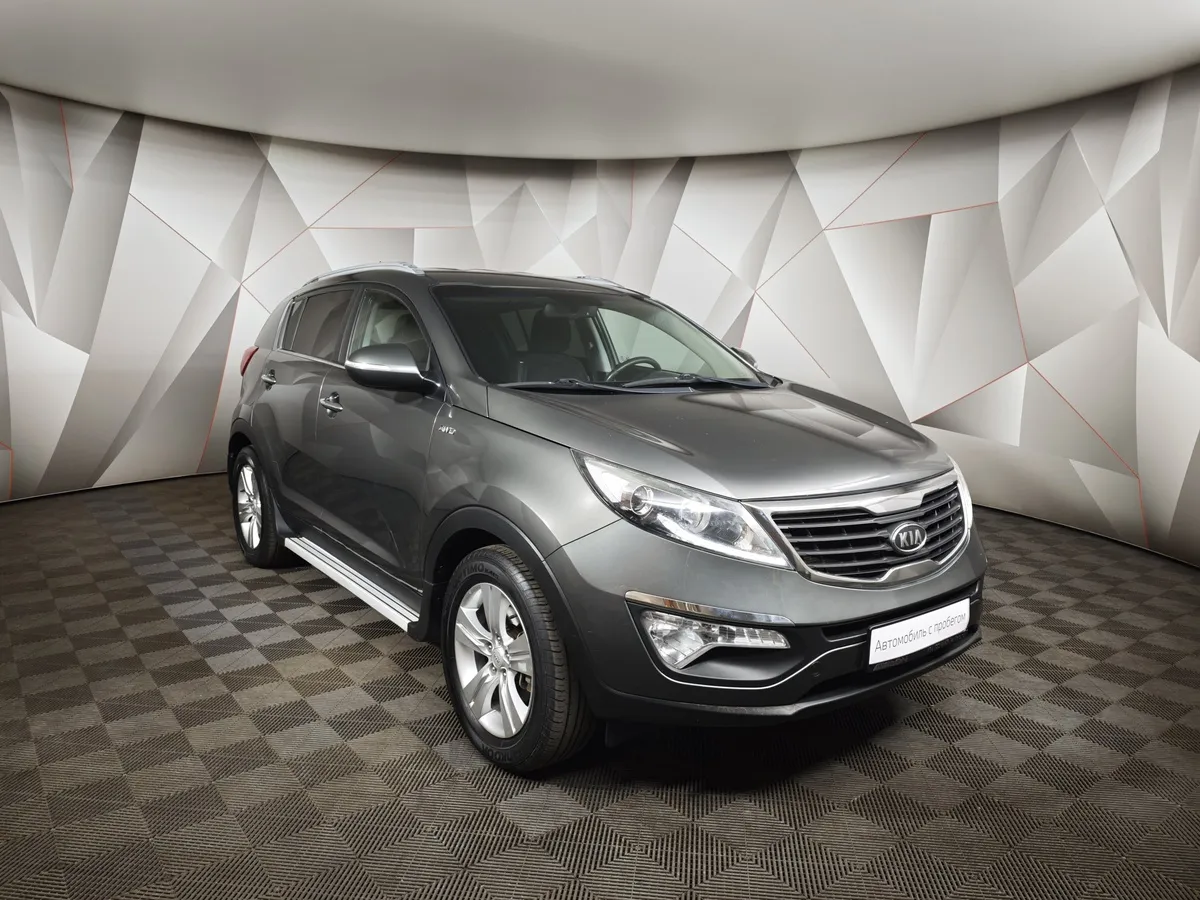 Kia Sportage 2.0 MT 4WD (150 л.с.) Серебристый в АВИЛОН. Слайд №3