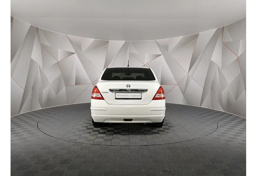 Nissan Tiida 1.6 AT (110 л.с.) Белый в АВИЛОН. Слайд №8