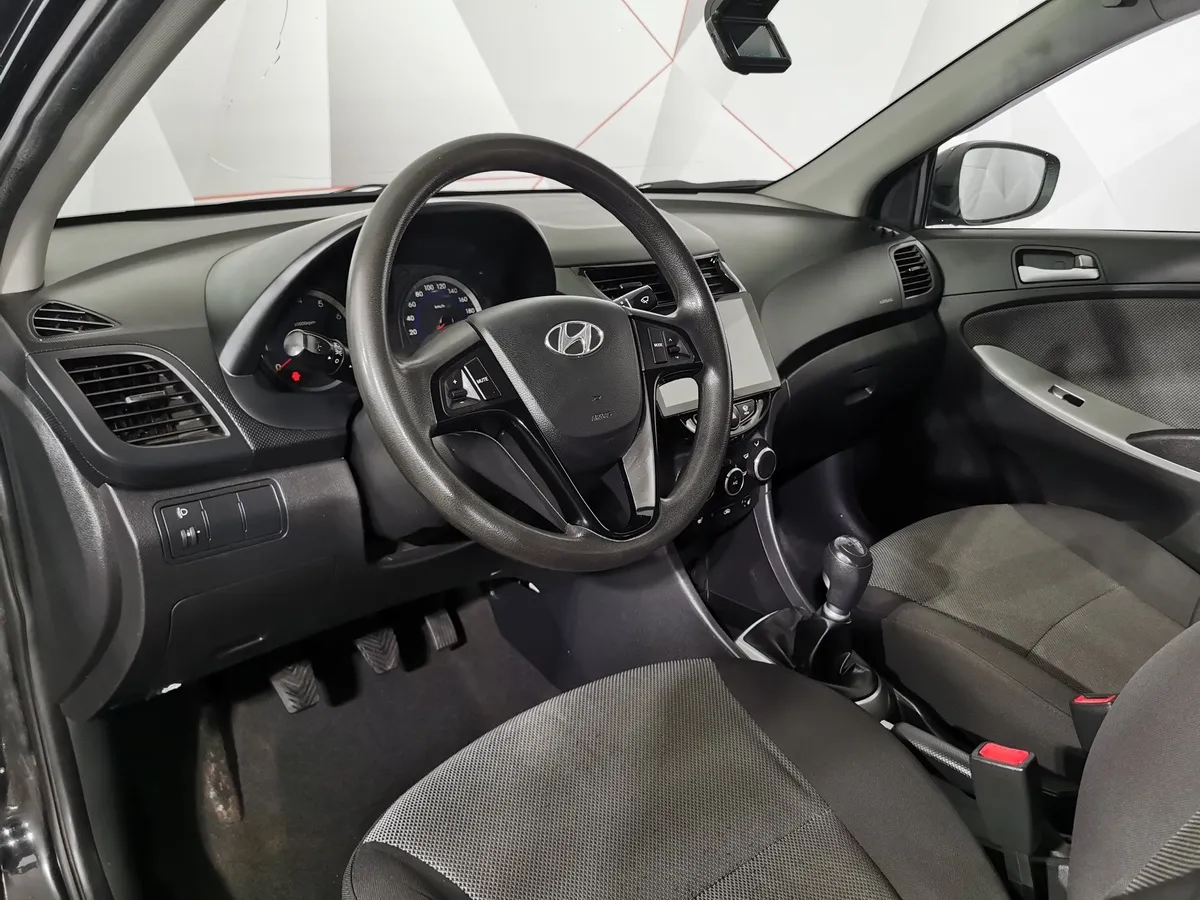 Hyundai Solaris 1.4 MT (107 л.с.) Active Черный в АВИЛОН. Слайд №18