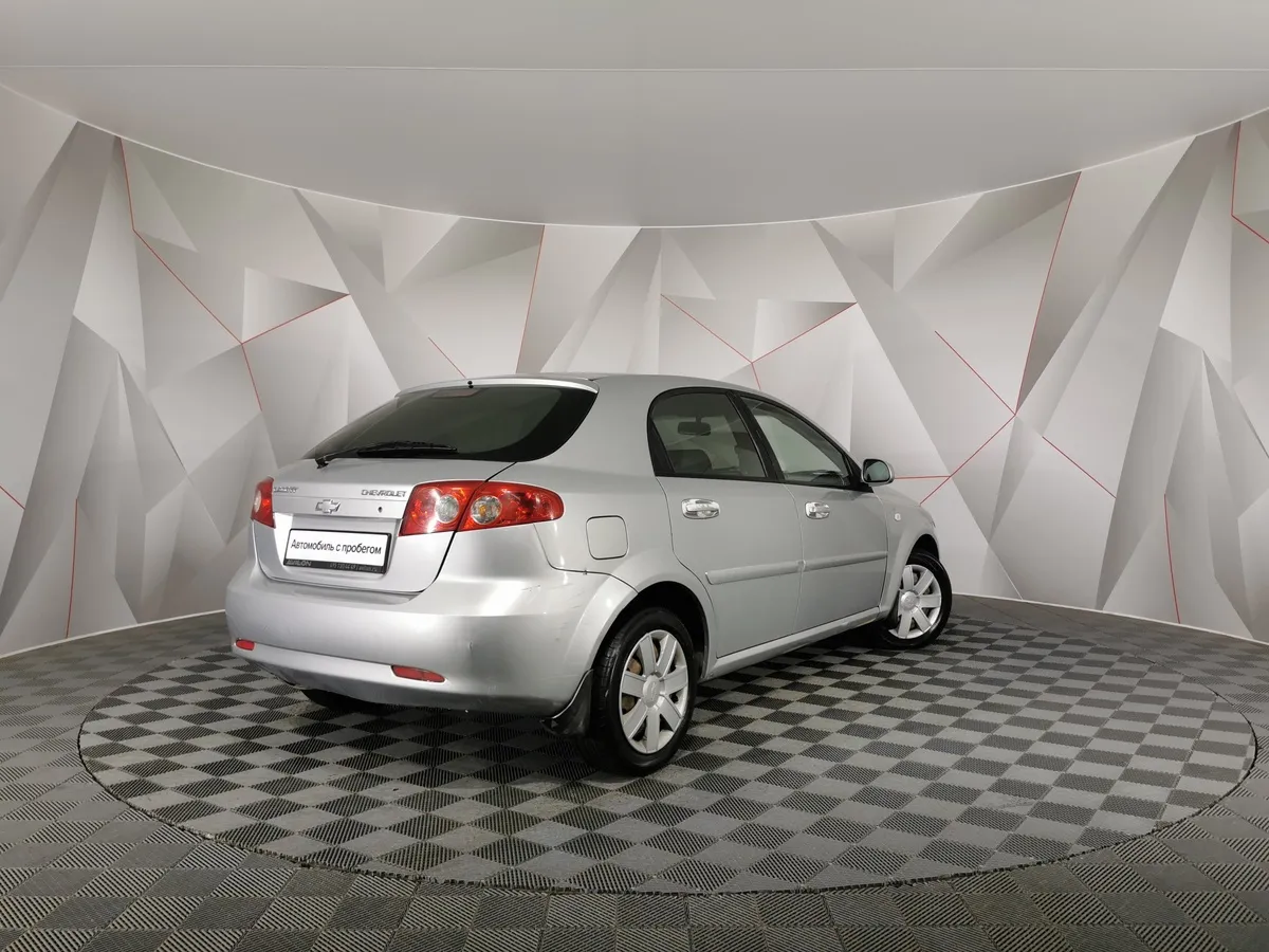 Chevrolet Lacetti 1.6 MT (109 л.с.) Platinum Серебристый в АВИЛОН. Слайд №2