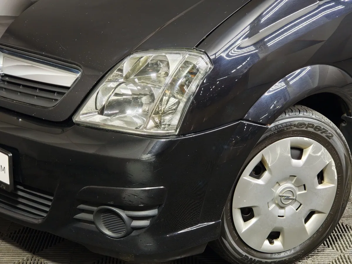 Opel Meriva 1.6 Twinport MT (105 л.с.) Черный в АВИЛОН. Слайд №9