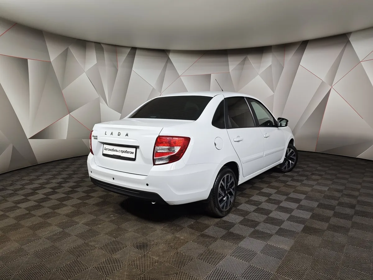 ВАЗ (Lada) Granta 1.6 MT 8кл (87 л.с.) Белый в АВИЛОН. Слайд №2