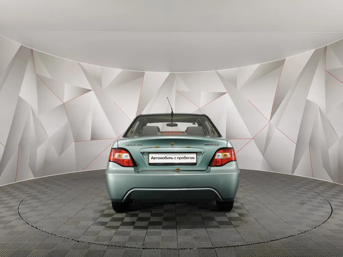 Daewoo Nexia 1.6 MT (109 л.с.) Зеленый в АВИЛОН. Слайд №8