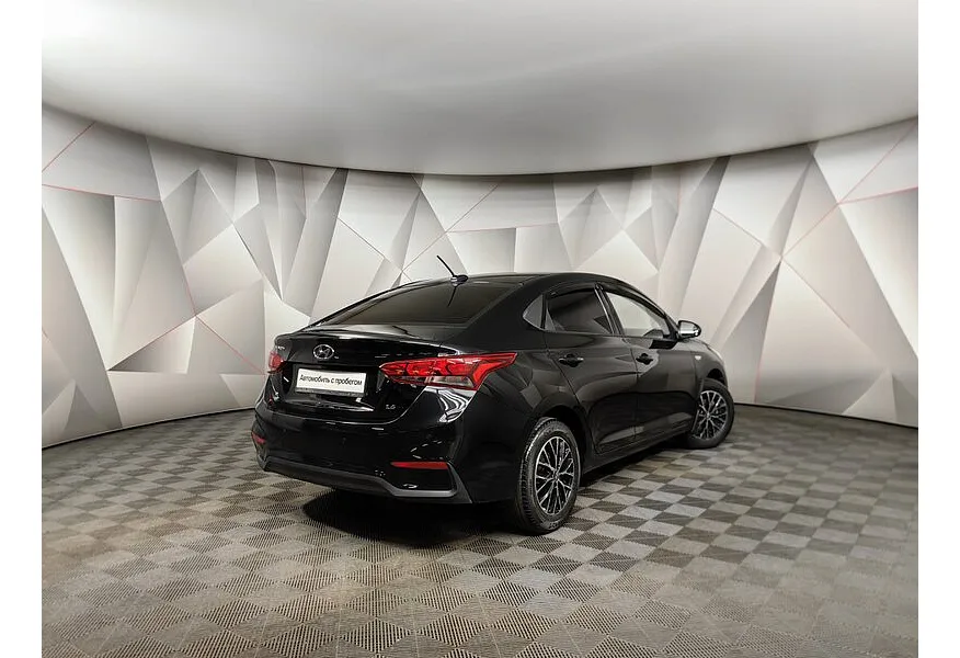 Hyundai Solaris 1.6 AT (123 л.с.) Comfort Черный в АВИЛОН. Слайд №2