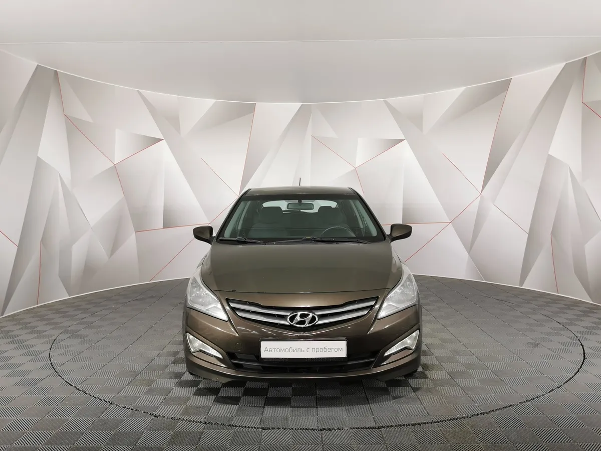 Hyundai Solaris 1.6 MT (123 л.с.) Comfort Коричневый в АВИЛОН. Слайд №7