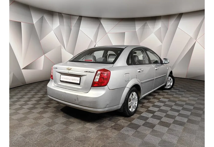 Chevrolet Lacetti 1.4 MT (95 л.с.) Серебристый в АВИЛОН. Слайд №2