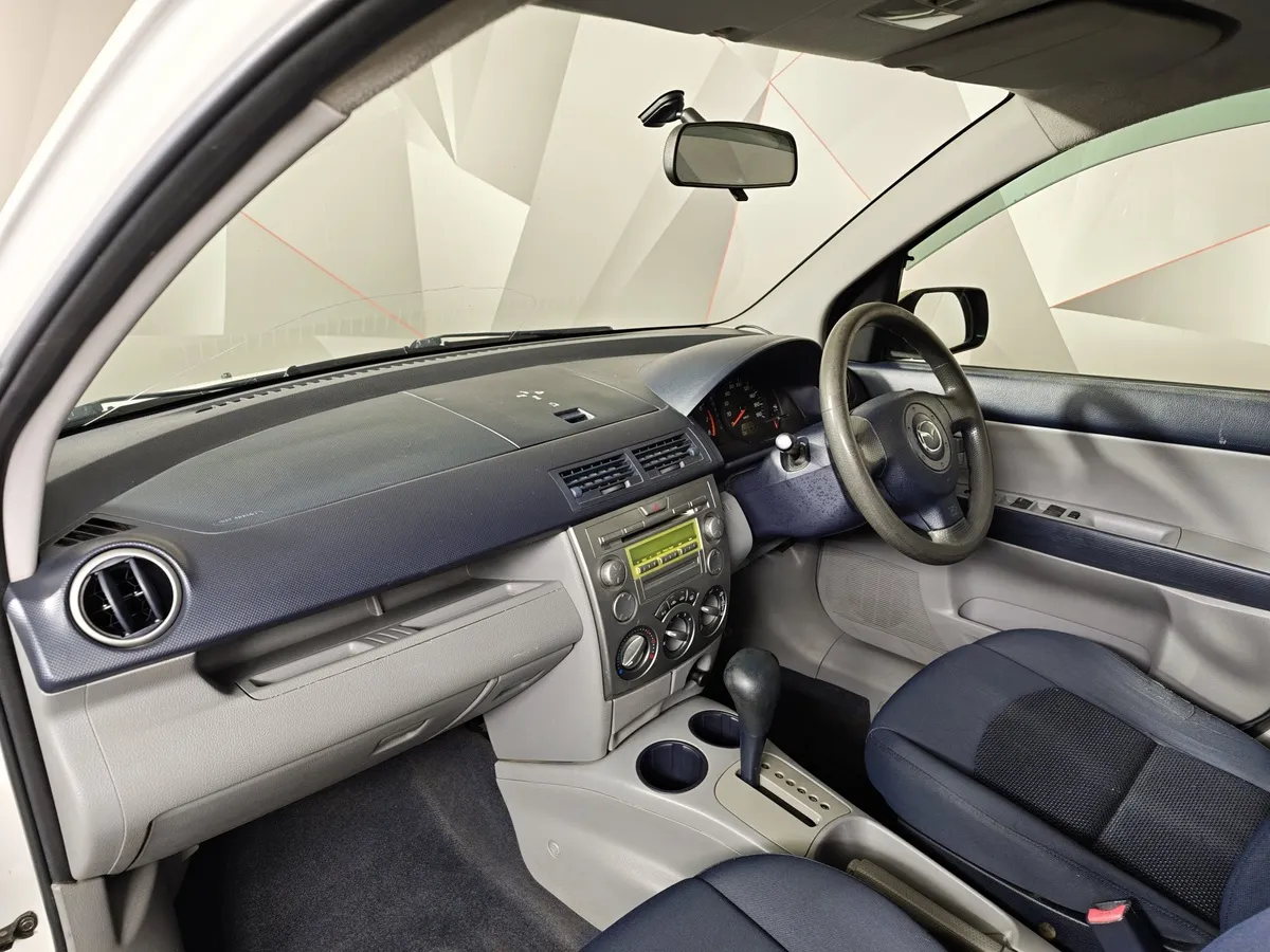 Mazda Demio 1.5 AT (100 л.с.) Белый в АВИЛОН. Слайд №17