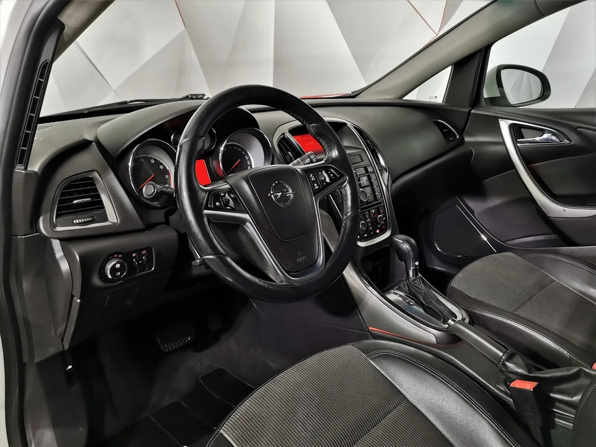 Opel Astra 1.4 Turbo AT (140 л.с.) Комбинированный в АВИЛОН. Слайд №17