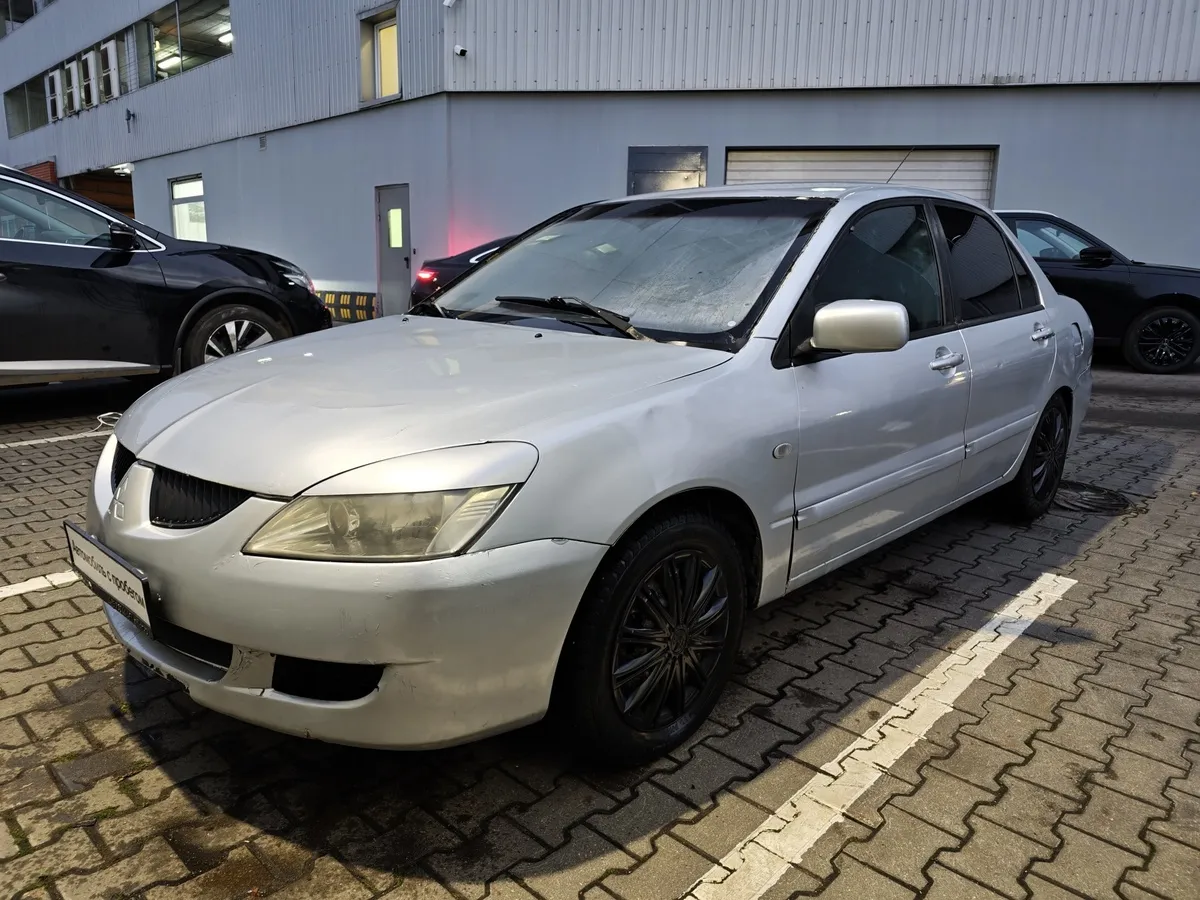 АВИЛОН - Mitsubishi Lancer 1.3 MT (82 л.с.) Белый - slide 10263619