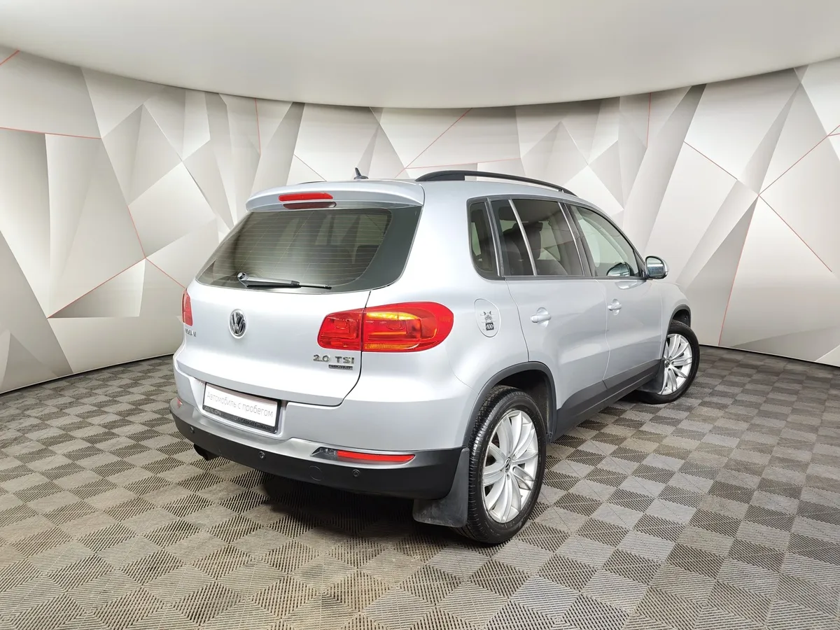 Volkswagen Tiguan 2.0 TSI 4Motion AT (180 л.с.) Sport&Style Серебристый в АВИЛОН. Слайд №2