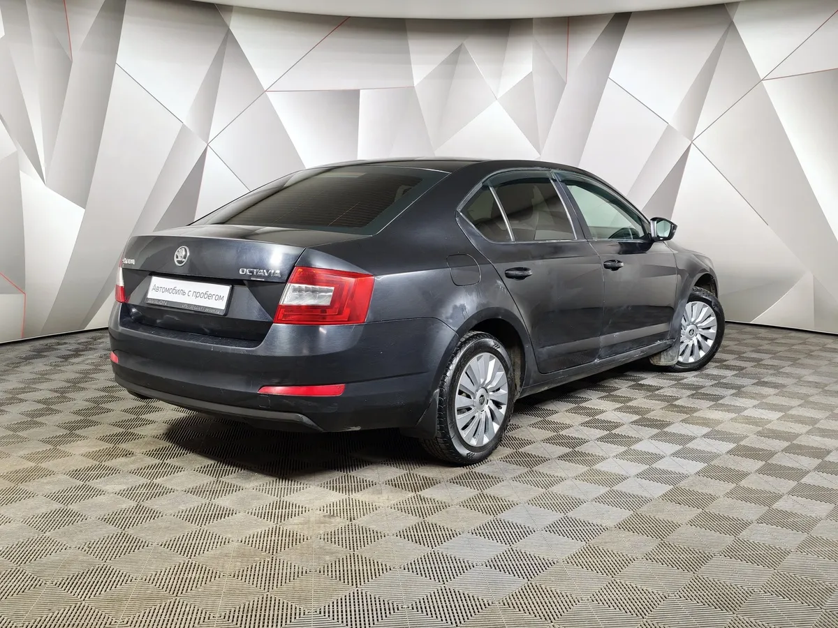 Skoda Octavia 1.6 MPI AT (110 л.с.) Черный в АВИЛОН. Слайд №2