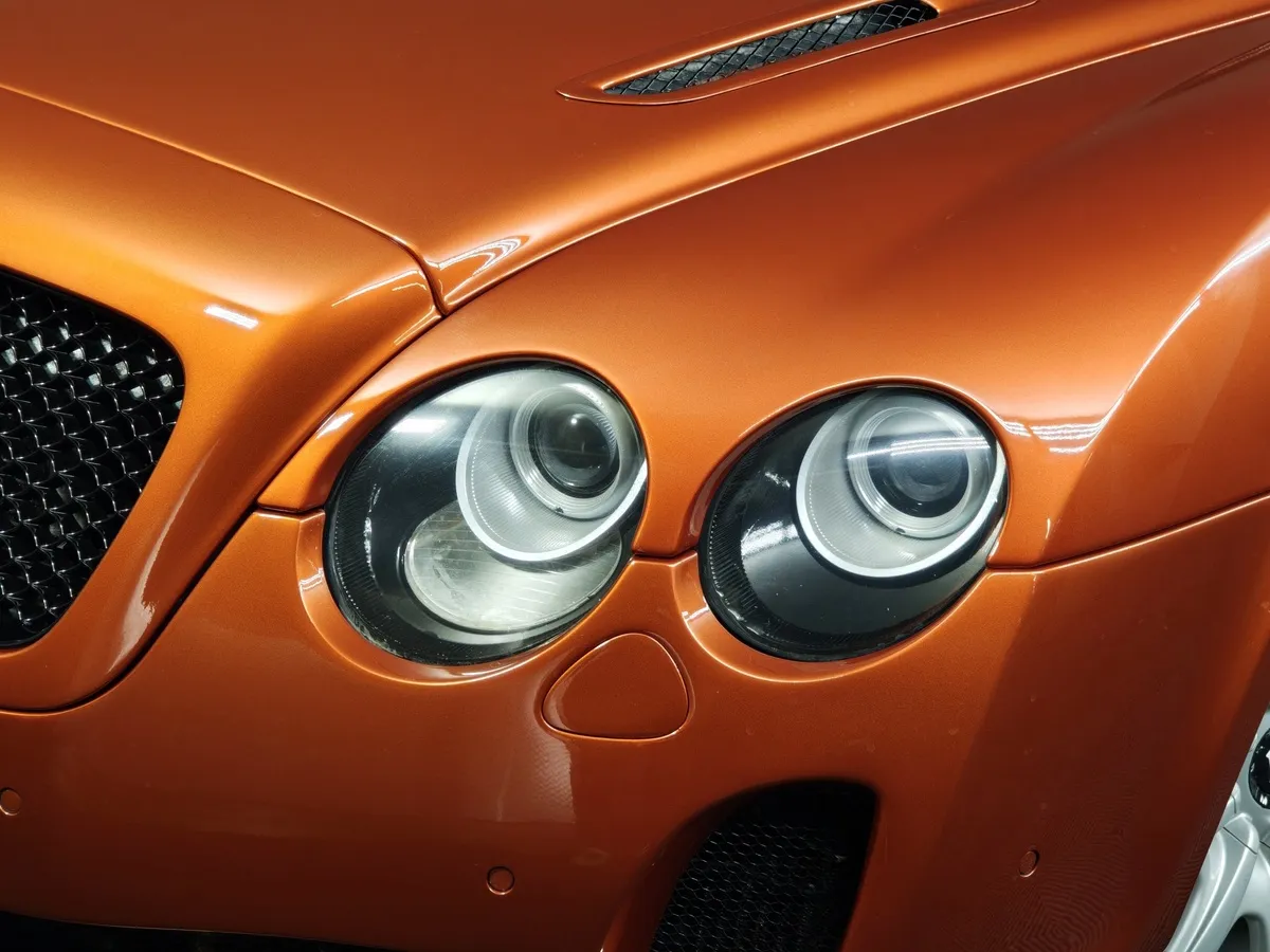 Bentley Continental GT 6.0 AT Twin Turbo (560 л.с.) Оранжевый в АВИЛОН. Слайд №10
