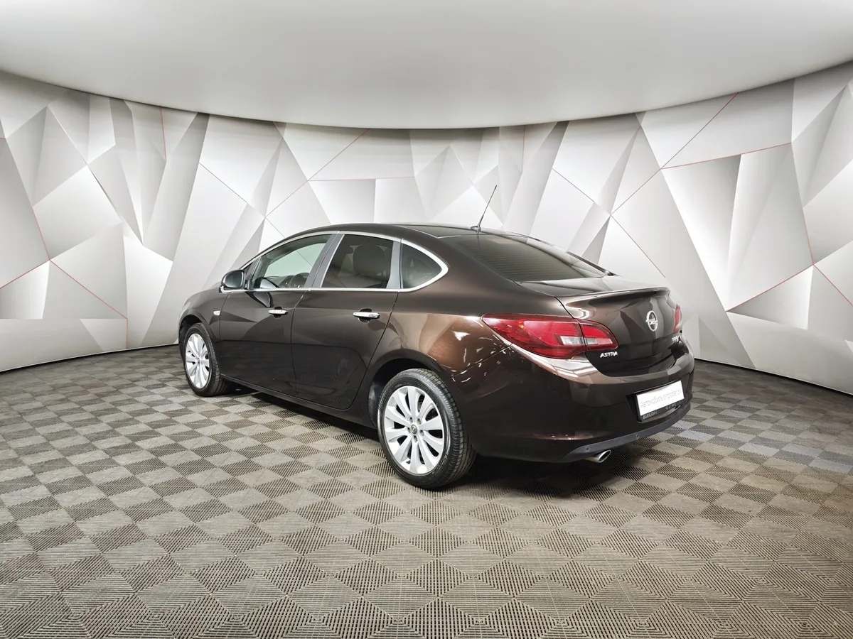 Opel Astra 1.4 Turbo AT (140 л.с.) Коричневый в АВИЛОН. Слайд №4