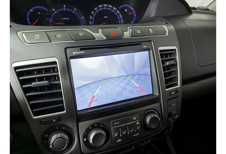 SsangYong Korando Turismo 2.2d AT 4WD (178 л.с.) Белый в АВИЛОН. Слайд №19