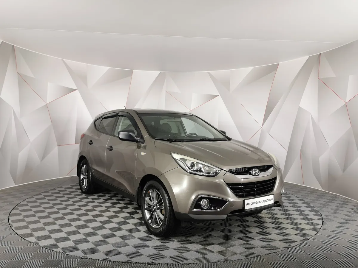 Hyundai ix35 2.0 MT 2WD (150 л.с.) Коричневый в АВИЛОН. Слайд №3