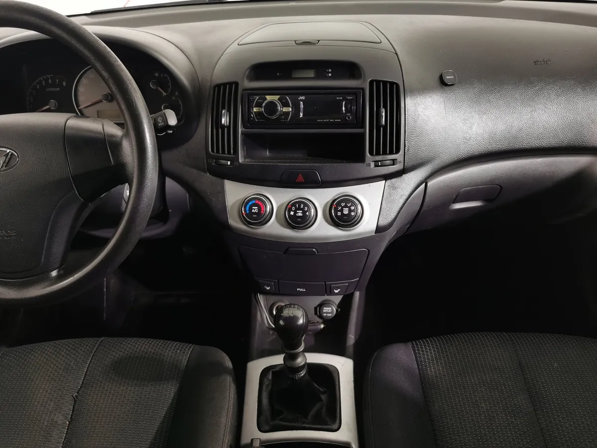 Hyundai Elantra 1.6 MT (105 л.с.) Серый в АВИЛОН. Слайд №12