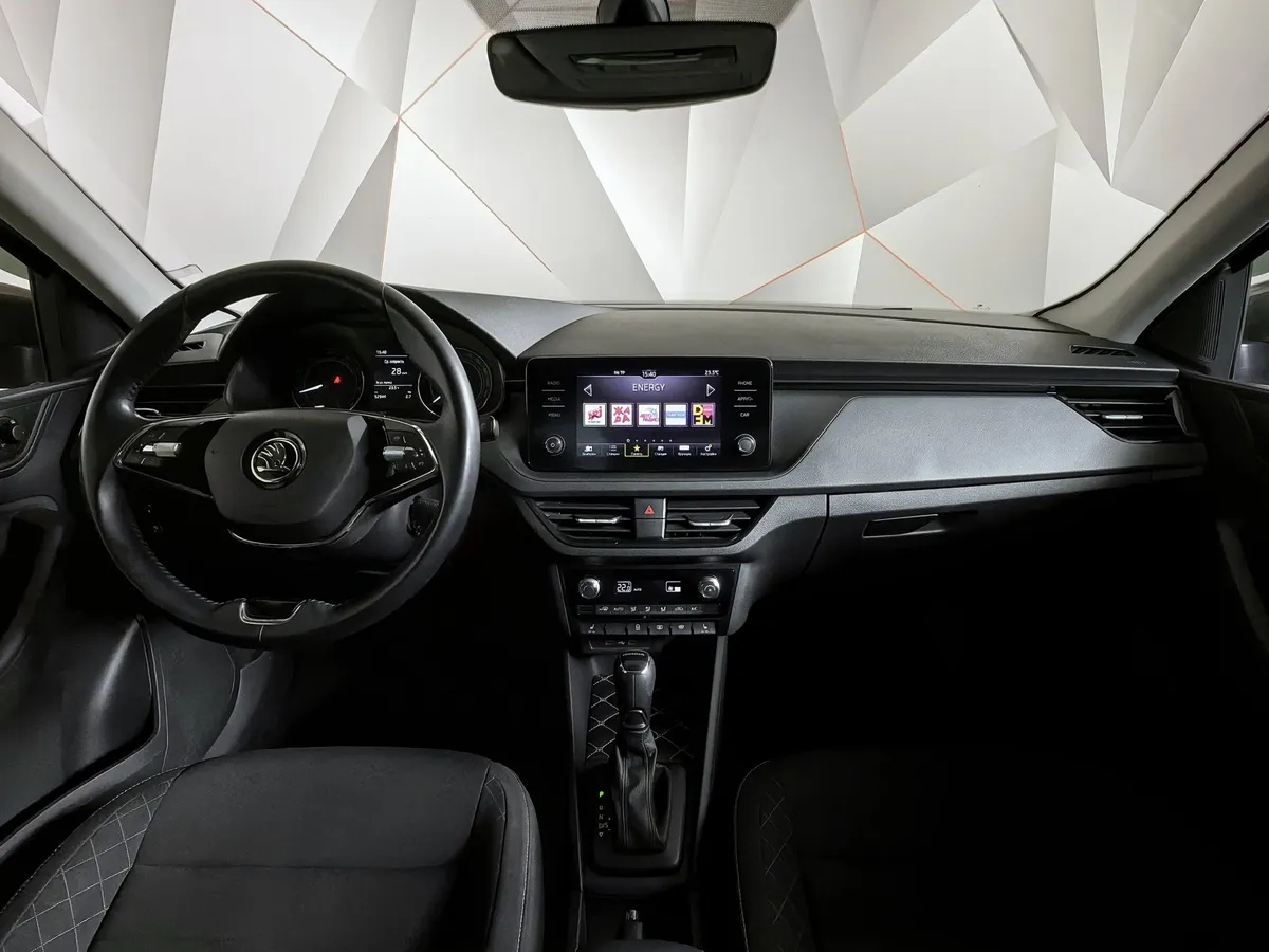 Skoda Rapid 1.6 AT (110 л.с.) Белый в АВИЛОН. Слайд №14