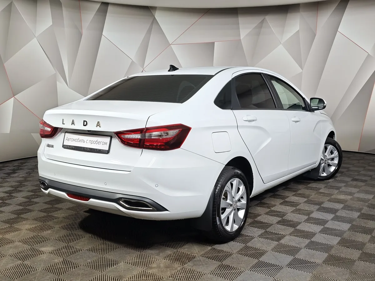 ВАЗ (Lada) Vesta 1.6 MT (106 л.с.) Белый в АВИЛОН. Слайд №2