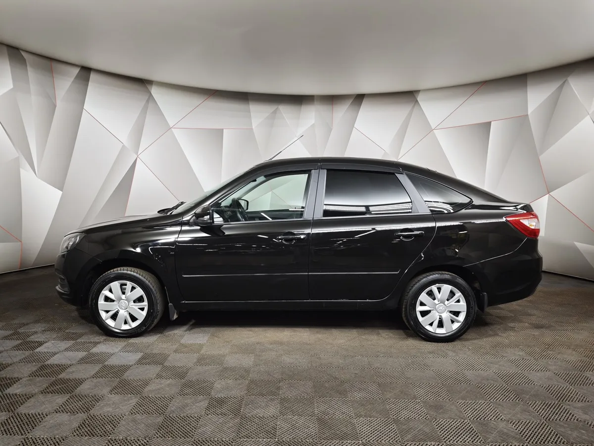 ВАЗ (Lada) Granta 1.6 MT 8кл (87 л.с.) Черный в АВИЛОН. Слайд №5