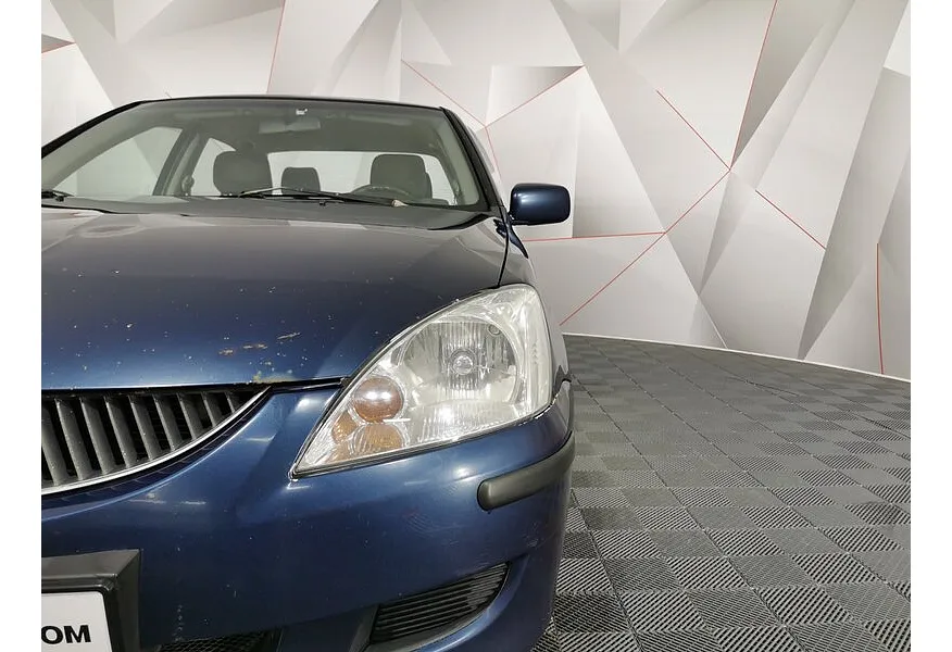 Mitsubishi Lancer 1.6 AT (98 л.с.) Синий в АВИЛОН. Слайд №10