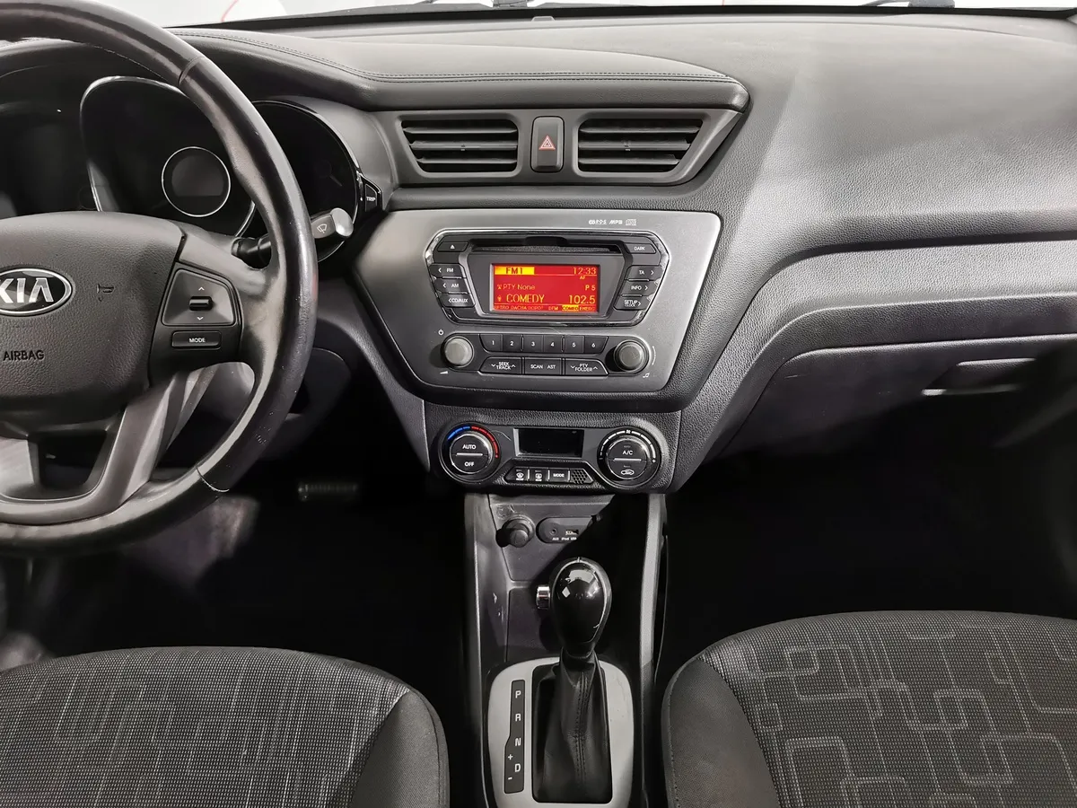 Kia Rio 1.6 AT (123 л.с.) Белый в АВИЛОН. Слайд №14