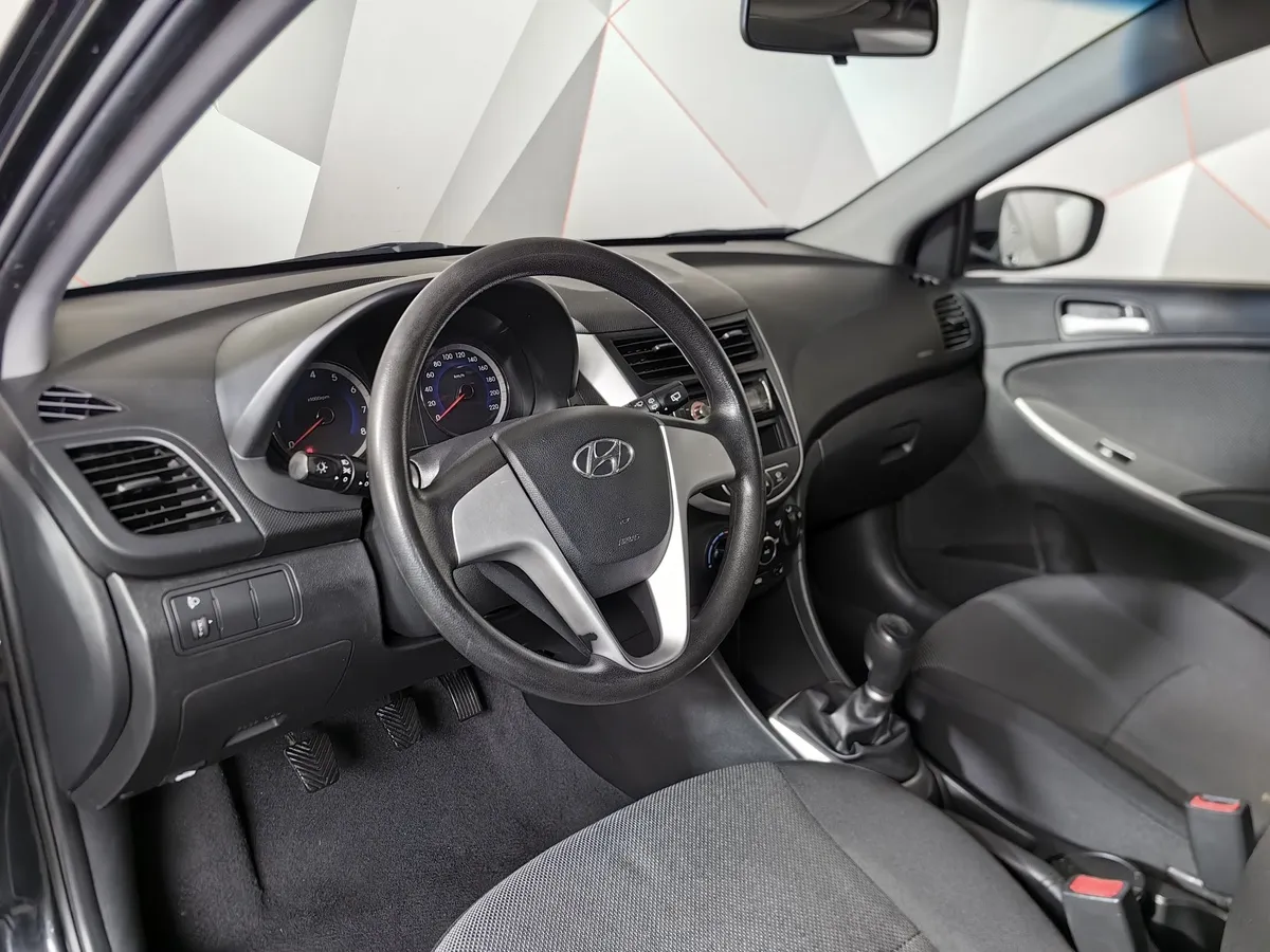 Hyundai Solaris 1.4 MT (107 л.с.) Active Черный в АВИЛОН. Слайд №19