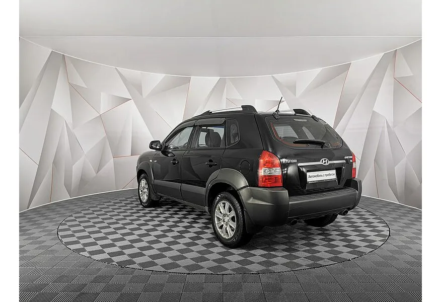 Hyundai Tucson 2.7 AT 4WD (175 л.с.) Черный в АВИЛОН. Слайд №4
