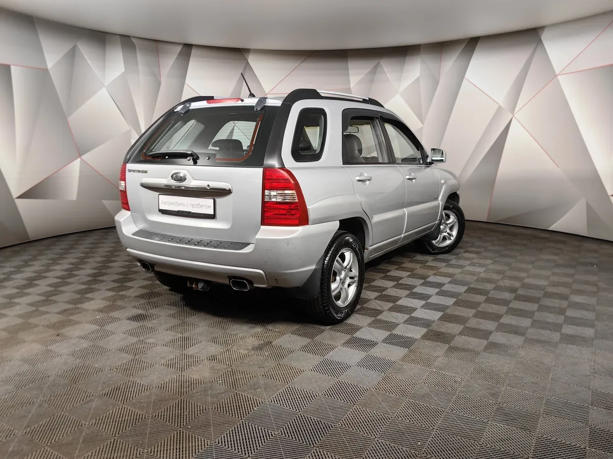 Kia Sportage 2.0 CRDi AT 4WD (112 л.с.) Серебристый в АВИЛОН. Слайд №2