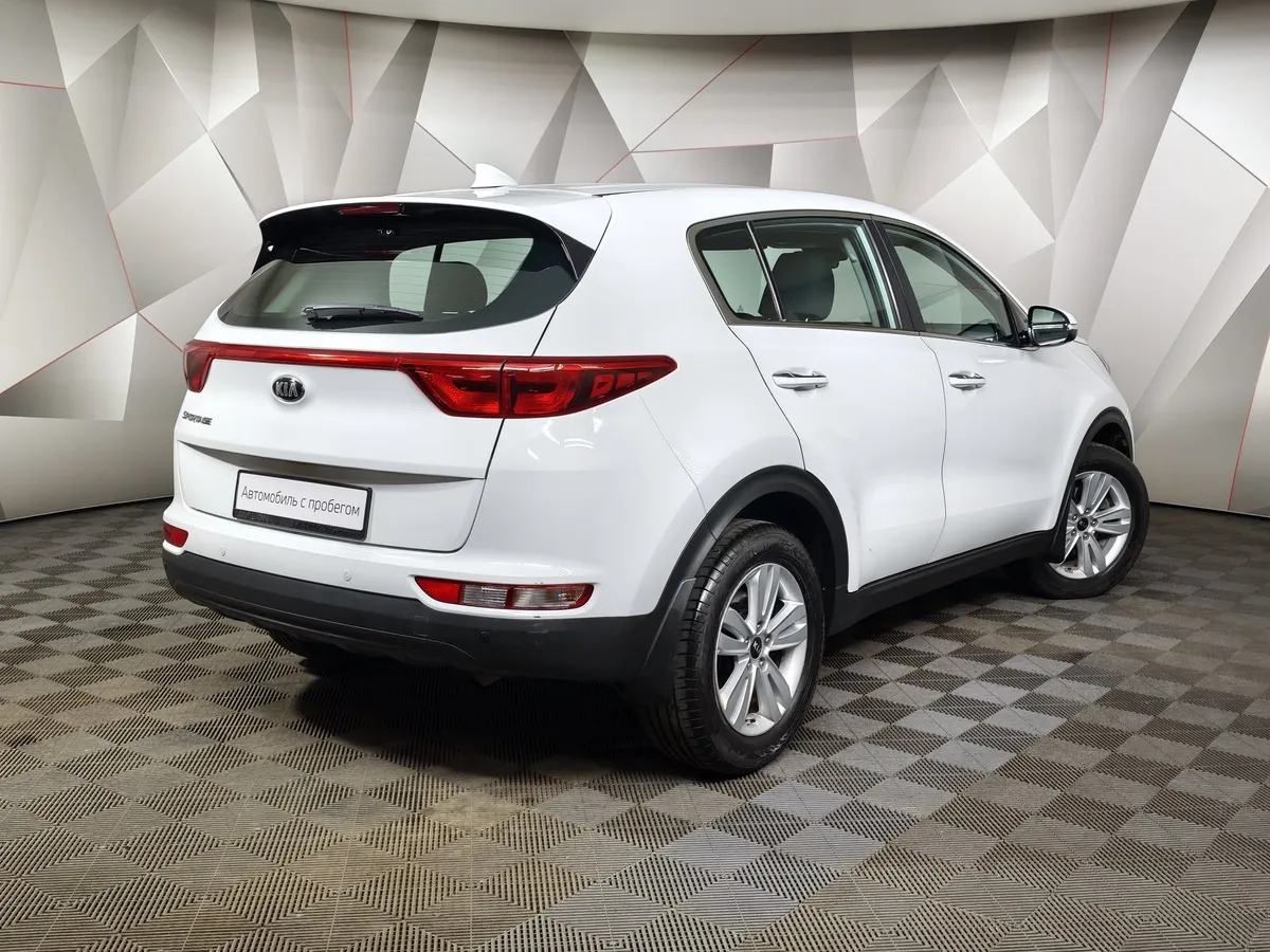 Kia Sportage 2.0 AT (150 л.с.) Comfort Белый в АВИЛОН. Слайд №2