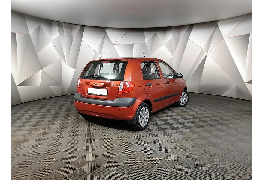 Hyundai Getz 1.4 AT (97 л.с.) Красный в АВИЛОН. Слайд №2