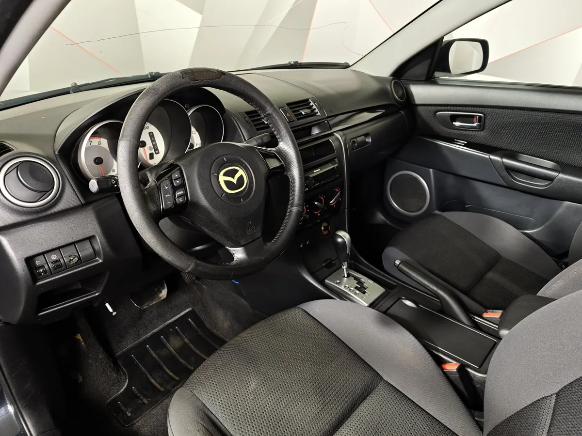 Mazda 3 1.6 AT (105 л.с.) Черный в АВИЛОН. Слайд №17