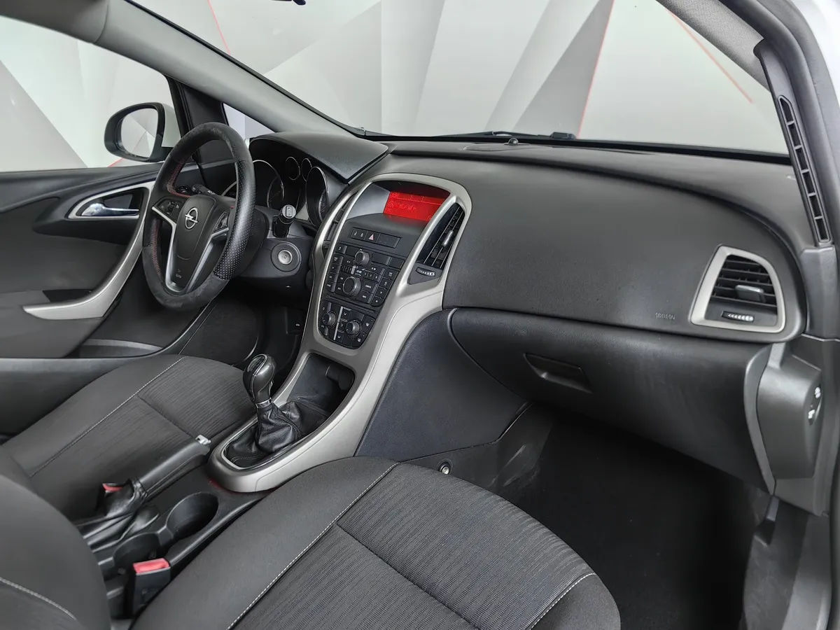 Opel Astra 1.6 MT (115 л.с.) Белый в АВИЛОН. Слайд №12