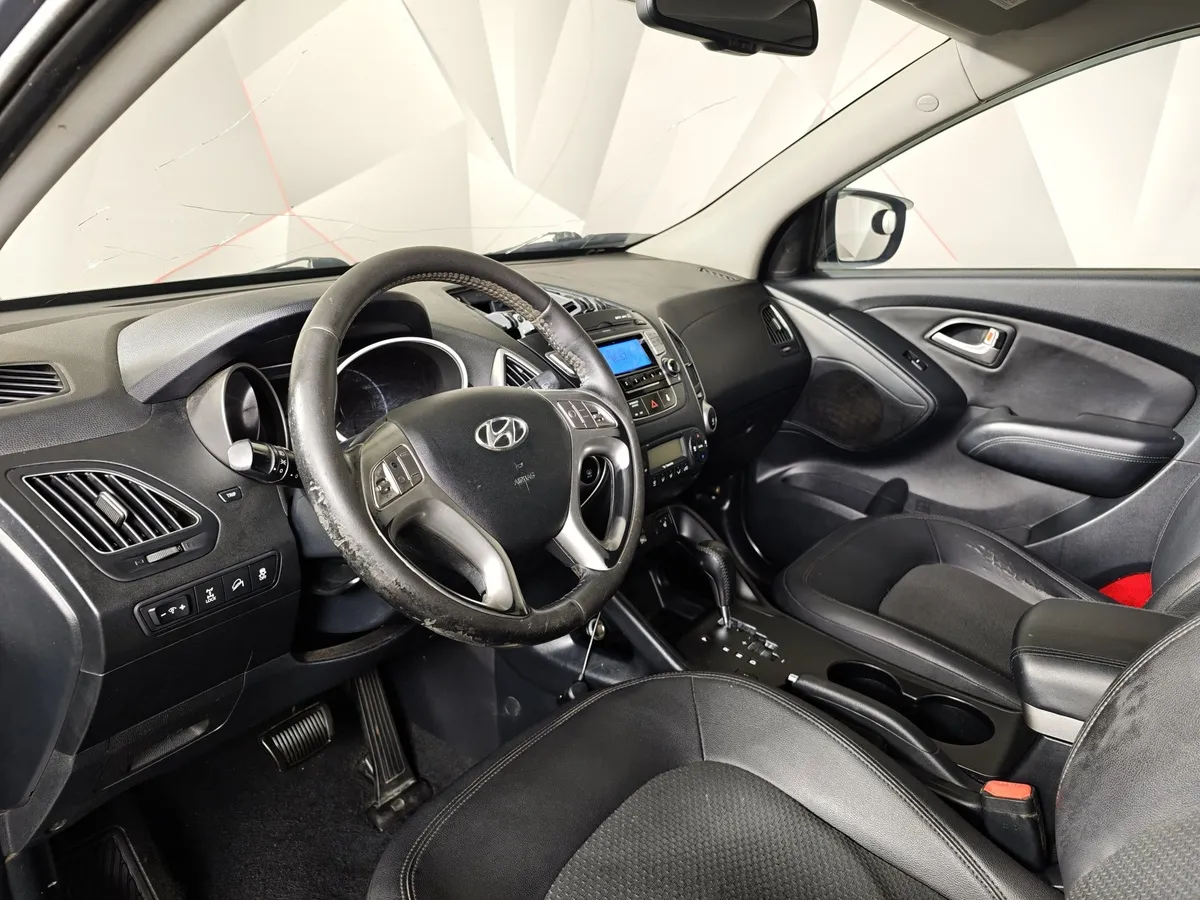 Hyundai ix35 2.0 CRDi AT 4WD (184 л.с.) Travel Серый в АВИЛОН. Слайд №17